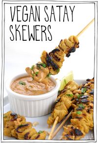 These vegan satay skewers are marinated in creamy coconut curry sauce, then grilled to perfection and served with spicy peanut sauce, and garnished with limes and chopped peanuts! Hello, deliciousness! These skewers are a super impressive appetizer or can be enjoyed as a main served with rice and veggies. #itdoesntastelikechicken #veganrecipes #soycurls