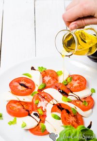 Keto caprese salad with balsamic glaze and basil