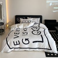 Elevate your bedroom style with the Black Love Pure Cotton Four-Piece Black And White Bed Set. This bedding set is all about simple elegance, combining black hearts and white letters to create a chic and modern look. Whether you have a full, queen, or king-sized bed, this set has got you covered with its perfectly fitting duvet cover. Made from 100% pure cotton, this bed set feels incredibly soft and comfy. Imagine snuggling into bed at night and feeling that gentle, breathable cotton against your skin. It’s not just about looks; it’s about experiencing a cozy, restful sleep every single night. The reactive printing process ensures that the beautiful black and white patterns stay vibrant, wash after wash. No more worrying about your favorite bed set fading. Plus, the satin weave gives it t