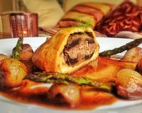 Portobello Mushroom, Hummus and Walnut Wellingtons served with a Red Wine Jus and Glazed Shallots - Vegan