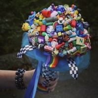 My alternative bridal bouquet. I made this from board game components, toys, beads, buttons, badges etc. Everything I love! #geekywedding #geekybride #boardgamebride #boardgamewedding #gamerbride #gamerwedding #gamergirl #boardgamegirl #offbeatbride #boardgamer #quirkybride #quirkywedding #handmade