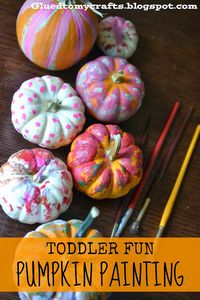 Toddler Fun - Pumpkin Painting. I let her color with paint while I melted crayons from the top. As well as put down painters tape for an "R" left showing through the paint!