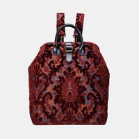 Discover luxury and functionality with our Burnout Velvet Wine Carpet Laptop Backpack. Crafted by Carpetbag of America, it blends opulent velvet with practical design, offering style and convenience in one. Perfect for those who value sophistication on the go.