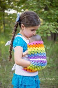 Now your mini-me can be just like you and carry their baby close to their heart! This doll carrier is constructed and worn similar to an ErgoBaby or Tula brand structured/buckled carrier, with buttons for easy-on/easy-off. Can be used for front or back carry. Choose from Panel Option A of Rainbow Stripes, or Panel Option B in Diagonal ZigZag, both in any colors you desire - just message me at checkout. (If no option is chosen you will receive Panel Option B in the colors shown in photo.) One siz