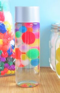 Floating pom poms sensory bottle | Education | sensory bottles #bottle #bottles #education #floating #sensory