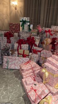 Mountains of presents: Later on Friday evening, the Bronx, New York native took back to her Instagram page and gave her 146 million fans and followers a glimpse at the plethora of gift piled up in her living room