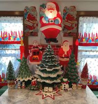 bob_richter on Instagram: "Merry Christmas Eve Day! Greetings from A Very Vintage Christmas display in my kitchen. I decorate this area differently each year. This year I let these wonderful vintage curtains be my color guide. Then I decided to showcase some of my favorite ceramic trees. Did you grow up with these? I added some favorite Santas & bottlebrush trees & I am very happy with the outcome. It’s hard not to smile when I walk in the kitchen! For ideas & inspiration, check out my b