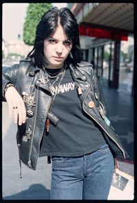 Joan Jett at The Pussy Cat Theatre, 1977 "Joan Jett standing in front of the old Pussy Cat Theatre where Deep Throat was playing. The Pussy Cat is long gone, but you can still go there. The address is 6656 Hollywood Blvd. and you can stand in the same spot that Joan once stood back in 1977." ~Brad Elterman Brad Elterman