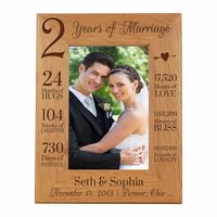 Engraved Anniversary Picture Frame Dimensions: 7.5" x 9.5" Frame holds a 5" x 7" photo Celebrate your special anniversary day with your lover by enjoying LifeSong Milestones Solid Wood Wedding Anniversary Picture Frame. Get this gift as a keepsake to remember your special day you made the ultimate bond. LifeSong Milestones has created the perfect First Anniversary photo frame gift. Wooden picture frames were designed, handcrafted, and engraved in the USA by © 2019 LifeSong Milestones.