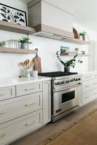 greige design shop + interiors alexandria project light grey cabinetry brass hardware