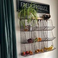 This funky wire bin adds a great farmhouse vibe and useful storage space. Hang it in the pantry, the kitchen, the office...anywhere you need a little organization and style. This wire wall rack has three equally sized bins. Comes with keyholes on back for hanging. Measures: 10''W x 10''D x 30½''H