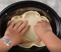 Press pie dough into a slow cooker to create a decadent dessert you can't resist