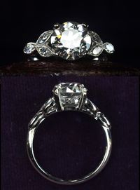 1920s Art Deco 1.90ct Old European Cut Diamond (GIA: I/SI2) RingPlatinum, Old Marquise & Single Cut Diamond Sides Probably one of the loveliest (and definitely one of the most valuable) rings we’ve ever had. The center diamond is nearly 2 carats and beautifully cut. This style of mount was popular in the 1930s, and we’ve had several of similar design before. But usually there are round cut diamonds set within each of the little leaf shapes, rather than actual marquise cuts, w