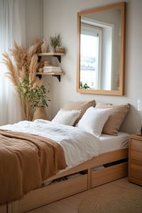 Get some quick tips and decor inspo to create a cozy bedroom in a small space.