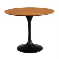 The Greenington Soho 36" Round Dining Table, Amber is available at The Organic Bedroom. PRODUCT DESCRIPTION The Soho dining table places solid Amber bamboo on a pedestal. Simple and modern, Soho’s 36” round, reverse beveled tabletop sits on a gracefully shaped tulip pedestal of matte black powder coated steel, contrasting beautifully with Amber’s rich grain and variety of colors. An update of a classic design, Soho’s small scale is designed to fit beautifully into small eating spaces. Sustainabl