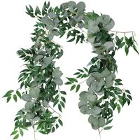 PRICES MAY VARY. Quantity: Comes In Faux Silver Dollar Eucalyptus Leaves Garland and Willow Leaves Twig Vine Garland Which Have Been Intertwined Together. This Greenery Garland includes 54 Eucalyptus Leaves Branches and 35 Willow Leaves branches. Size : This mixed eucalyptus garland can be taken apart into two strands. Fake Silver Dollar eucalyptus garland strand is 5.5 feet in length, 5.9" in width.The willow vine strand is completely flexible with many shoots coming off the main vine so you ca