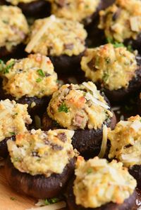 Classic Stuffed Mushrooms recipe featuring baby bella mushrooms stuffed with a mixture of cream cheese, herbs, onions, and more cheese.