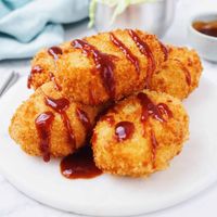 Korokke Japanese Potato Croquettes. Crispy panko breaded potato croquettes that are also soft on the inside. Totally indulgent and great as a snack with katsu sauce! This recipe is vegetarian.