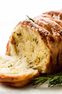 Starting from a simple homemade dough, this rosemary garlic pull apart bread is assembled with butter, herbs, garlic, and cheese.