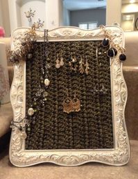 handmade crocheted earring holder🧶  frames are unique, no two are the same.  After you buy, message me which yarn colour and frame colour you would like and i will make one for you💗