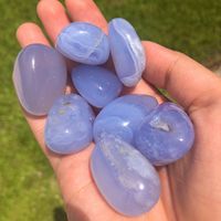 You will receive ONE intuitively chosen blue chalcedony tumbled stone. Each tumbled stone is unique in patterning and shape. Some tumbles have blue lace banding and some are a more solid blue. All equally beautifully. Blue chalcedony is a throat chakra stone great for communication, spirituality, and calming nerves / energy.