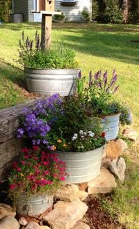 Fill Your Deck with Plants -         Soften your space with beautiful blooms and lush greenery from container gardens. It's easy to tuck a few containers here and there.   Here's a hint: You may not be limited to growing annuals. Perennials and shrubs survive outdoors in containers if the container is large enough, which may be 4- to 5-feet wide in northern climates.