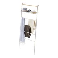 Add a modern touch to your space with this sleek blanket ladder. With five bars, it provides ample space to drape and display your favorite throws. Crafted from a combination of metal and manufactured wood, it's built to last and can support up to 33 pounds. Its powder-coated finish adds a stylish touch while also offering scratch and water resistance. Plus, the included shelf offers extra storage for smaller items. A must-have for any contemporary home. Color: White Yamazaki Home Leaning Ladder