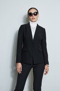 Elie's signature fitted blazer is slim, polished and modern. Single breasted with peaked lapels with an impeccable cut, it has the chic factor you are looking for in your new favorite blazer. Single Button Blazer Runs true to size. Model is 5'9" and wearing size 4 Dry Clean Only Imported Style #: ETR22451