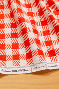 Must-have flannel for cozy winter sewing! Stock up on Checkered Charm Flannel from our Christmas In The Cabin fabric collection! Perfect for comfy clothes & quilt backings. Sustainable fabrics for handmade gifts! #PatchworkQuilting #Sewing #AGFChristmasInTheCabin #FlannelFabric #WinterSewing #Quilting #Oekotex #Textiles #GinghamPrint #ChristmasCrafts #HolidayFabric