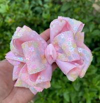 "Handmade pink hair bow made with 1.5\" sequin flowers ribbon and pink tulle . 5\" approx. Alligator clip 75 mm."