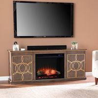 Give your home a stylish upgrade with this electric fireplace console. Goldtone inlay design adds modern appeal, while push-to-open doors discreetly store your games and movies. Flickering LED flames and adjustable heat settings create cozy ambiance in your space, functioning with or without heat for year-round enjoyment. Cozy up to family movie night with this freestanding media fireplace in your living space or game room. Southern Enterprises