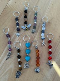 These key rings are one offs When ordering state colours or charm choice ie animal, flower, heart etc