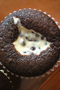 Chocolate Chip Cream Cheese Cupcakes... these look so good, I'm drooling! I love that they don't even need icing (sometimes it's too much), and I'm DEFINITELY going to try these with just a boxed chocolate cake mix as the base. Remember: as the recipe states, mini chocolate chips are ESSENTIAL! I might toss a few into the chocolate batter as well ;)