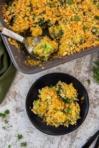 Cheesy Broccoli Casserole with tender broccoli, a homemade cheddar cheese sauce and finishes with a crispy, buttery cracker crumb topping.