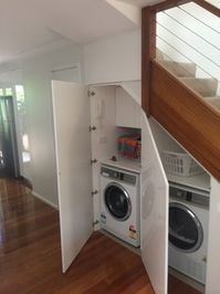 laundry under staircase - Google Search