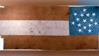 Members of Companies A and I of the First Kansas Infantry crossed the Missouri River to take this flag from the town square at Iatan, Missouri, on June 3, 1861.