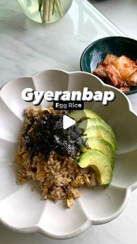 Sarah Ahn | Korean Cooking 🇰🇷 on Instagram: "Egg rice — the beloved, nostalgic dish to many Asians growing up. Here’s how we enjoy gyeranbap, what Koreans call egg rice. This is a dish we often crave for its taste and nostalgia.

Full recipe link in bio. 

INGREDIENTS
- 2 teaspoon neutral oil
- 2 large eggs
- 1 cup (185g) warm, cooked white rice, short or medium-grain
- 1 tablespoon soy sauce
- 2 ½ teaspoons toasted sesame oil
- 35-40g (a little less than half) avocado, sliced thin, crosswise
- 3g seasoned gim shreds, to garnish
- avocado
- seasoned gim (seaweed)
- kimchi

INSTRUCTIONS
1. In an 8-inch non-stick skillet, heat oil until shimmering over medium-high heat. Add eggs and scramble until cooked through and tender (do not make crispy, should be soft and not browned), about 1 minut