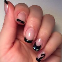 Put a feline twist on your black tipped manicure for Halloween.