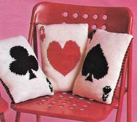 Includes instructions to make Playing Card Cushions / Pillows with Ace Hearts, Clubs, Diamonds ( not pictured ) and Spades Size 21 x 30cm ( 8 x 12 ins ) Worked in DK ( 8 ply )