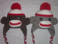 Crocheted sock monkey hat. can be made in many different color options. If you would like a color that is not listed, message me and I will make a custom listing for you.  0-3 Months-fits 13-14" 3-6 Months-fits 15-17" 6-12 Months-fits 17-19" *If you have a head measurement I can do a custom fit, or you may select from the standard sizes