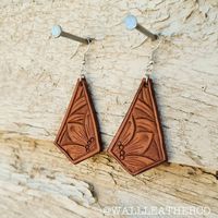 Earrings are lightweight and hand tooled from scratch. Finished product may vary slightly from the picture due to its handmade nature. Earrings are finished with silver earring hooks for easy wearing.