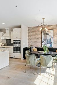 🤩More mid-century modern, please! We've reinvented the clean lines of this design style with a rustic twist in our Thorpe chandelier. Its classic sputnik shape is coated in a faux hickory wood finish and accented by golden satin. 📷: @yourintegrityhomes on IG Click the link to see more: