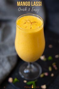 Fresh Mango Lassi made with just a few ingredients, is so creamy and refreshing. This Mango Lassi which is a favorite to enjoy at Indian restaurants, can be easily made at home in no time! #mangolassi #indianlassi #fruitsmoothie #healthysmoothie #pipingpotcurry | pipingpotcurry.com