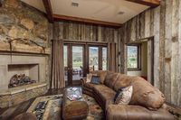 Rustic living space in this Arizona Ranch house! Check out more home projects featuring our reclaimed wood products www.trestlewood.com! Siding Details: Antique Gray Barnwood. Photoset #23231