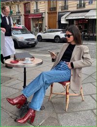 Embrace Parisian-inspired chic style with these effortless blue jeans and boots outfits! Elevate your casual look with a touch of sophistication, as can be seen in this classy outfit with burgundy ankle boots and a checkered blazer.