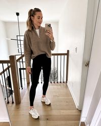 chic athleisure outfit, black legging outfit, new balance sneaker outfit, brown sweater outfit, half zip sweater