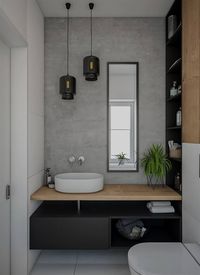 Varying tones of grey paired with timber and gorgeous pendant lights are an inviting combination #SmallBathroomDesigns