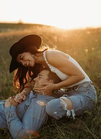 Vintage Western Engagement Pictures | Montana Photographer | Playful couples photos. This western engagement session inspiration, shot in the heart of Montana during the picturesque fall months, is everything a country couple could dream of! See unique engagement photos poses, unique engagement photos fall, western engagement pictures poses and unique engagement photos outdoors. Book Brogan to capture your country engagement at photographybybrogan.com.