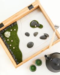 DIY Mini Zen Garden. A shadow box, metal back scratcher and some craft store supplies... a wonderful gift of mindfulness for a busy exec!