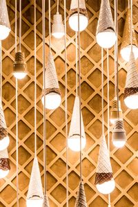 Dangling light fixtures created by the artist Alex Garnett in a room of the museum dedicated to ice cream cones. (Photo: George Etheredge/The New York Times)